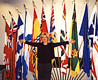 Photo of Babett by flags. 